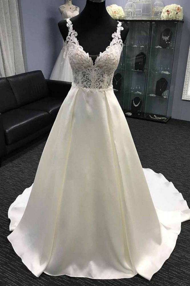 Wanna get a dress in Tulle, A-line style, and delicate Lace work? We meet all your need with this Classic V-neck White A-line Lace appliques Princess Wedding Dress at factory price.