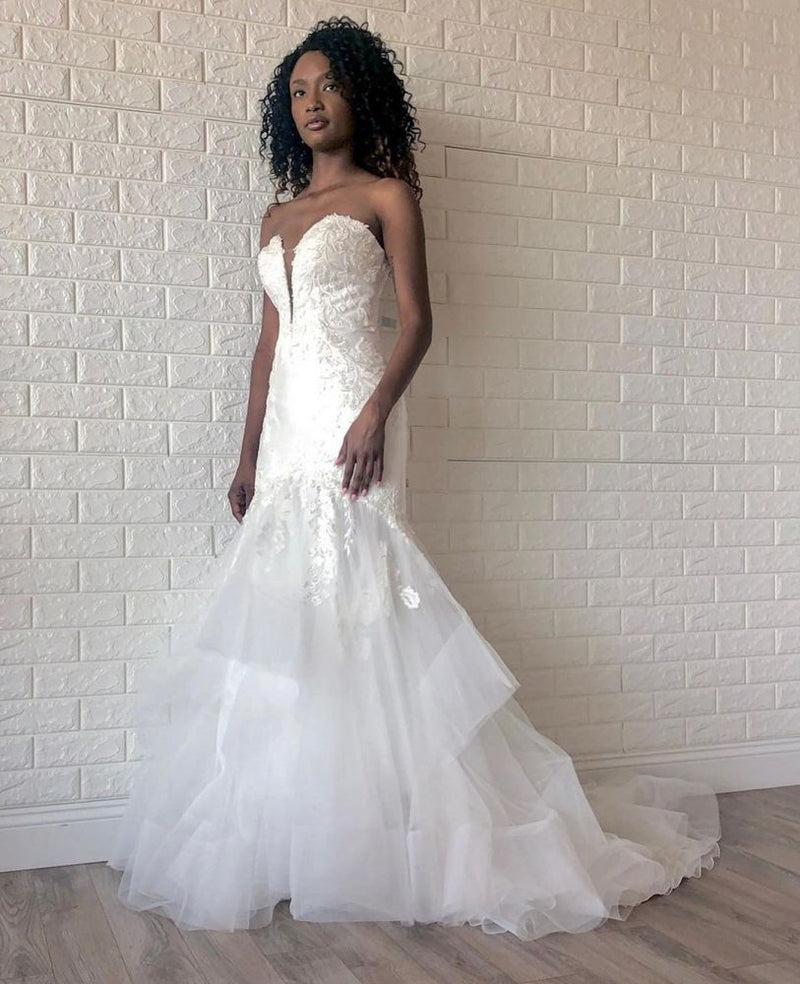 Looking for a dress in Tulle,Lace, Mermaid style,and Amazing Lace work. We have all covered on this White Sweetheart Mermaid Spring Wedding Dress with Multi-Layers design.