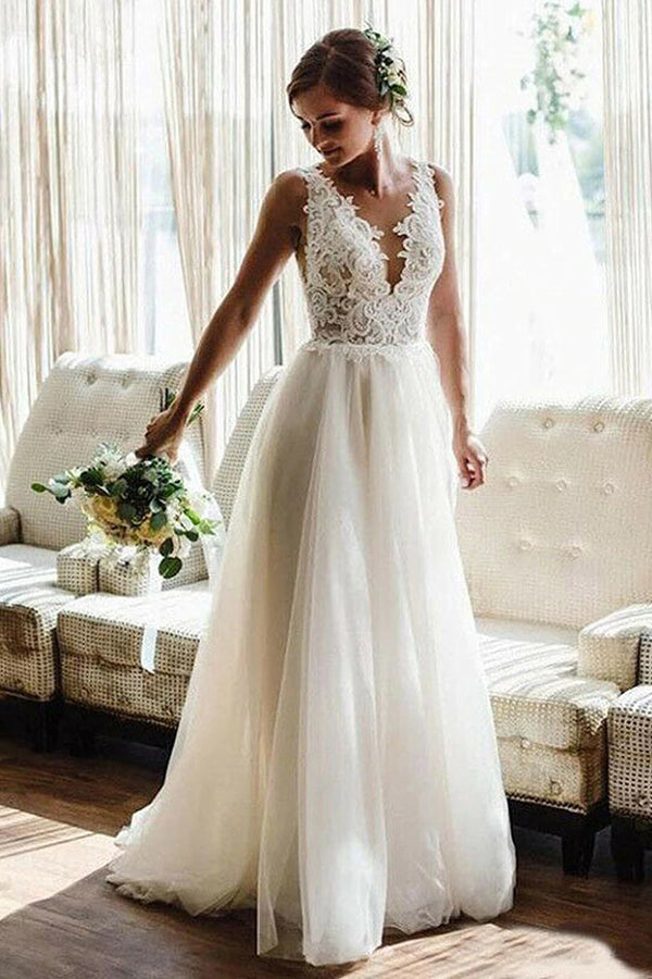 Looking for a dress in Tulle, A-line style, and AmazingBeading work? We meet all your need with this Classic White/Ivory V-Neck Lace Tulle Bridal Dress Aline Beach Wedding Dress.
